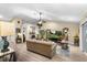 Open-concept living room with a vaulted ceiling, and comfortable furnishings at 1165 Baltic Ln, Winter Springs, FL 32708