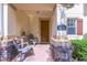 Inviting front porch with seating, decorative accents, and a view of the home's exterior at 14128 Avenue Of The Grvs, Winter Garden, FL 34787
