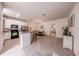 Spacious living area featuring an eat-in kitchen, dining area, and natural light at 14128 Avenue Of The Grvs, Winter Garden, FL 34787