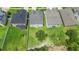 Aerial view of the home's placement within the community and large backyard at 1509 Cedar Lake Dr, Orlando, FL 32824
