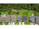Overhead shot of the property showcasing a spacious backyard, a well-maintained roof, and proximity to green spaces and amenities at 1509 Cedar Lake Dr, Orlando, FL 32824