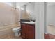 This bathroom is complete with a single sink vanity, tub, and shower at 1509 Cedar Lake Dr, Orlando, FL 32824
