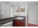 This bathroom features a vanity with a single sink and a mirror on the wall at 1509 Cedar Lake Dr, Orlando, FL 32824