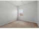 Bright bedroom with neutral carpeting and fresh paint provides a calming atmosphere at 1509 Cedar Lake Dr, Orlando, FL 32824