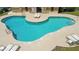 Community pool featuring a unique layout, sunbathing deck and ample seating at 1509 Cedar Lake Dr, Orlando, FL 32824
