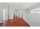 Wood-look floors brighten up this hallway and staircase at 1509 Cedar Lake Dr, Orlando, FL 32824