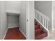 A spacious hall and stairway feature wood look plank flooring at 1509 Cedar Lake Dr, Orlando, FL 32824