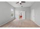 Large main bedroom featuring a ceiling fan and an ensuite bathroom at 1509 Cedar Lake Dr, Orlando, FL 32824