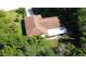 Aerial shot showing the roof and surrounding greenery and landscaping at 1509 Huntington St, Deltona, FL 32725