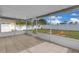 Covered patio with tile flooring and view of the fenced-in backyard at 16053 Wilkinson Dr, Clermont, FL 34714