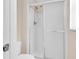 Shower with glass doors and chrome fixtures at 16053 Wilkinson Dr, Clermont, FL 34714
