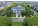 Gorgeous aerial view of the community center, including an immaculate lawn and parking at 1636 Hanks Ave, Orlando, FL 32814