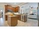 Beautiful kitchen with granite countertops, stainless steel appliances, and an open-concept design at 1636 Hanks Ave, Orlando, FL 32814