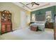 Serene main bedroom with tray ceilings, accent wall, and ample closet space at 1636 Hanks Ave, Orlando, FL 32814