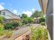 A serene backyard with lush landscaping, offering a private outdoor space at 1751 Chatham Cir, Apopka, FL 32703