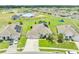 A residential homesite aerial view with a private backyard play area and multi-car garage at 1789 Chatsworth Cir, St Cloud, FL 34771