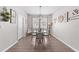 Bright dining room with modern light fixture and stylish decor, perfect for Gathering meals at 1789 Chatsworth Cir, St Cloud, FL 34771
