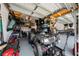Spacious garage with organized storage, providing ample space for vehicles and equipment at 1789 Chatsworth Cir, St Cloud, FL 34771
