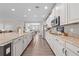 Well-appointed kitchen with granite countertops, stainless steel appliances, and ample cabinet space at 1789 Chatsworth Cir, St Cloud, FL 34771