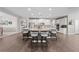 Bright and airy kitchen featuring an island with barstool seating and stainless steel appliances at 1789 Chatsworth Cir, St Cloud, FL 34771