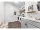 Laundry room features plenty of storage and counterspace in a functional space at 1789 Chatsworth Cir, St Cloud, FL 34771