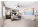 Serene main bedroom with ceiling fan, soft lighting, and elegant decor for relaxation at 1789 Chatsworth Cir, St Cloud, FL 34771