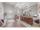 Inviting office space with natural light, dark wood floors, and a stylish desk at 1789 Chatsworth Cir, St Cloud, FL 34771