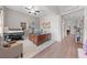 Inviting home office featuring a large desk, custom wood paneling, and modern finishes at 1789 Chatsworth Cir, St Cloud, FL 34771