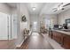 Inviting office space with natural light, dark wood floors, and a stylish desk at 1789 Chatsworth Cir, St Cloud, FL 34771