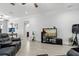 Open-concept living room with ample space for entertainment and relaxation, featuring neutral paint at 18826 Reynolds Pkwy, Orlando, FL 32833