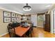 Dining room with wood floor and many decorations at 1924 Summerfield Rd, Winter Park, FL 32792