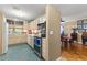 The updated kitchen flows into the dining room with an open floorplan at 1924 Summerfield Rd, Winter Park, FL 32792