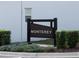 The Monterey community sign is visible from the street, with landscaping at 193 E Warren Ave, Longwood, FL 32750