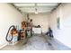 Spacious garage with washer, dryer, and overhead door at 1941 Sunset Palm Dr, Apopka, FL 32712
