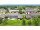 Aerial view of gray townhomes featuring green space and private patios at 2092 Switch Grass Cir, Ocoee, FL 34761