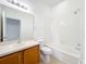 Bathroom features a single vanity, and tub and shower combination at 2092 Switch Grass Cir, Ocoee, FL 34761