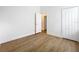 Bedroom featuring neutral walls, wood-look flooring and a closet at 2092 Switch Grass Cir, Ocoee, FL 34761