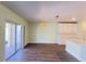 Open dining area with sliding doors to a patio and a convenient breakfast bar at 2183 Leather Fern Dr, Ocoee, FL 34761