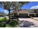 Inviting townhouse with a two-car garage and meticulously maintained landscaping at 2183 Leather Fern Dr, Ocoee, FL 34761