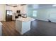 Beautiful kitchen with stainless steel appliances and an open view to the living area at 2183 Leather Fern Dr, Ocoee, FL 34761