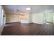 Open floor plan showcasing a modern living space with hardwood floors at 2183 Leather Fern Dr, Ocoee, FL 34761