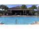 Community pool invites you to cool off on a hot summer day at 2183 Leather Fern Dr, Ocoee, FL 34761