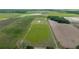 Wide aerial view of the house, barn, and large parcel of land at 22212 Sw 210Th Ave, Dunnellon, FL 34431
