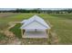 A birds-eye view of the rear porch and landscaping at 22212 Sw 210Th Ave, Dunnellon, FL 34431