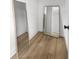 The hallway has floor to ceiling mirrors at 22212 Sw 210Th Ave, Dunnellon, FL 34431
