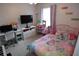 Bedroom with toys, a TV, and a desk at 2241 Retreat View Cir, Sanford, FL 32771