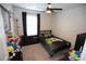 Bedroom with dark furniture, a window, and vibrant decorations at 2241 Retreat View Cir, Sanford, FL 32771