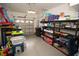 Organized garage with ample storage shelving and various household items at 2241 Retreat View Cir, Sanford, FL 32771
