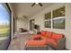 Inviting covered patio with brick flooring and comfortable seating arrangements at 2759 Purple Meadow Ct, Minneola, FL 34715