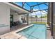 Gorgeous backyard pool with a screened enclosure, perfect for relaxing and entertaining outdoors at 308 Clearwater Ln, Poinciana, FL 34759